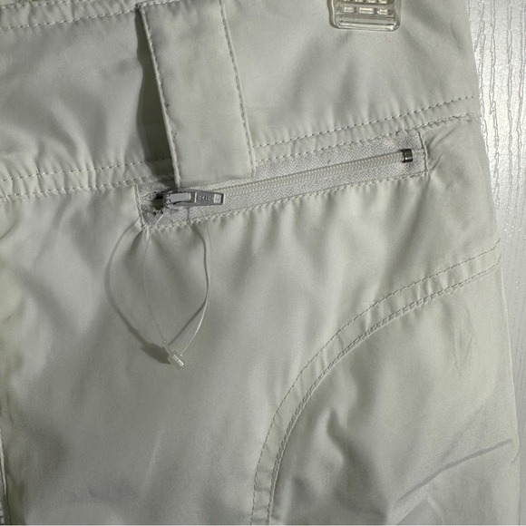 Obermeyer white stirrup ski pants, size 8 short, polyester and nylon - Picture 2 of 14